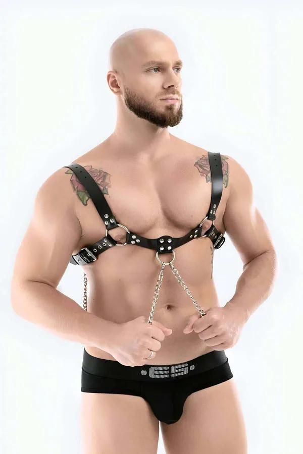 Model wearing black Men's Adjustable Vegan Leather Chest Harness with chrome-plated steel chains and silver alloy hardware front view