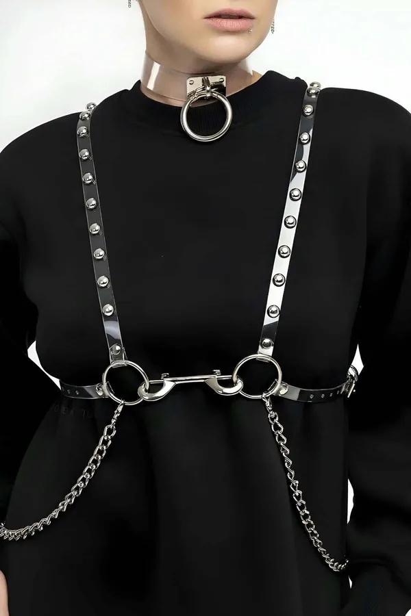 Clear PVC studded body harness and choker set with silver O-rings and detachable waist chains worn over black top