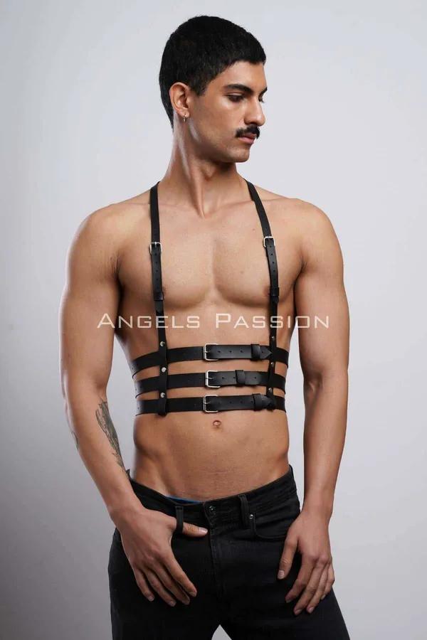 Black faux leather multi-strap chest harness with three horizontal bands and silver rectangular buckles worn by male model